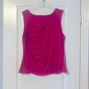 Pink top, very flattering.